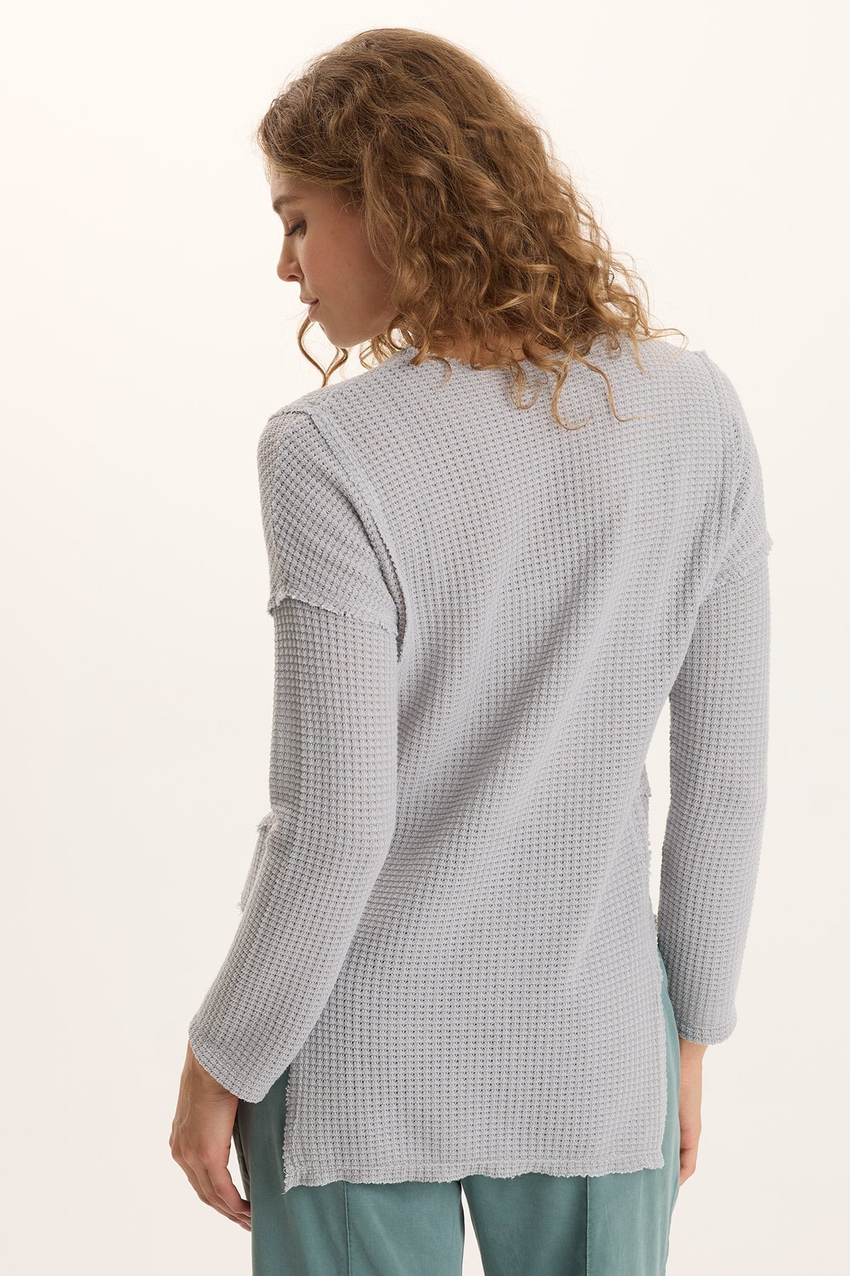 XCVI Arnie Thermal Asymmetrical Hem V-Neck Top 